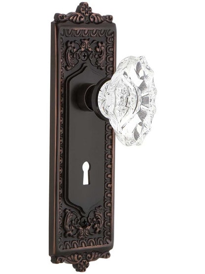 Egg and Dart Mortise-Lock Set with Chateau Crystal Glass Knobs in Timeless Bronze.